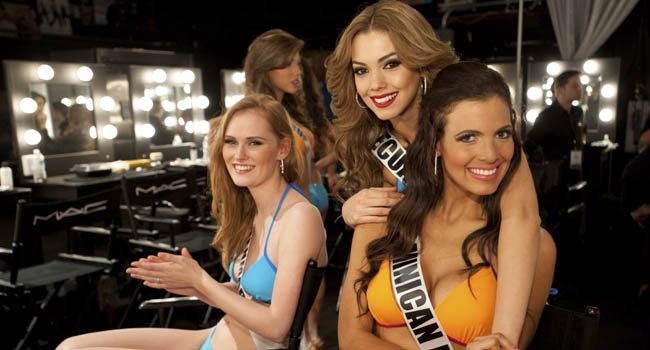 Miss Denmark 2012 Hewitt, Miss Ecuador 2012 Perez and Miss Dominican Republic 2012 Lieggi pose backstage during the 2012 Miss Universe Presentation Show at PH Live in Las Vegas
