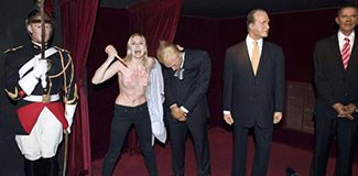 FEMEN Putin'in heykelini devirdi