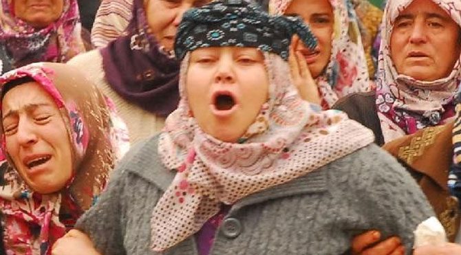 'Beni de Okan'ımla birlikte gömün'