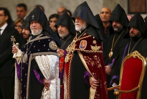 Catholicos of All Armenians Karekin II (L) stands before Pope Francis leads a mass on 100th anniversary of Armenian mass killings in St. Peter's Basilica at the Vatican