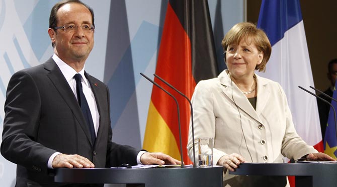 Merkel ve Hollande yarın Yunanistan'ı görüşmek için bir araya geliyor