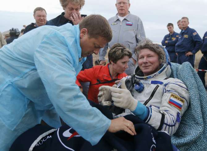 2015-09-12T044925Z_388740533_GF10000202733_RTRMADP_3_SPACE-STATION-CREW