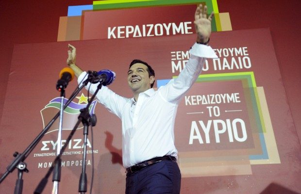 Former Greek prime minister and leader of leftist Syriza party Alexis Tsipras waves to supporters after winning the general election in Athens