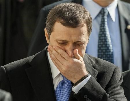 Moldova's Prime Minister Vlad Filat leaves after a session of the Parliament in Chisinau