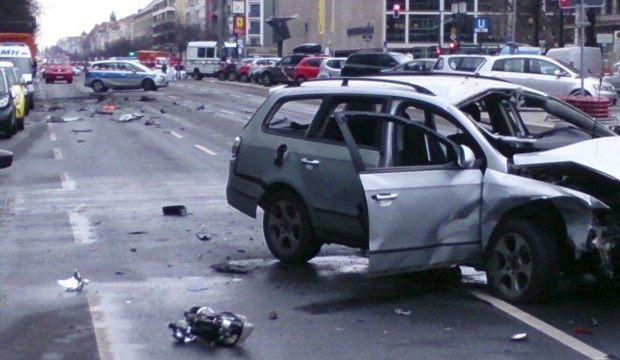 Damaged Volkswagen car stands in the Bismarckstrasse in Berlin