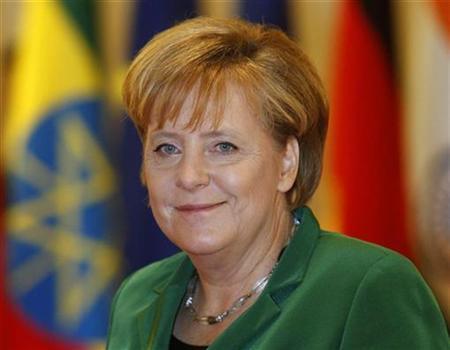 Germany's Chancellor Merkel arrives for opening plenary session of G20 Summit in Seoul