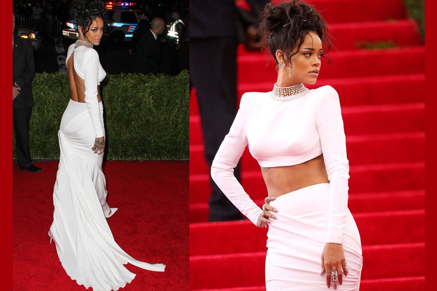 2014'teki Met Gala'da Dolce&Gabbana iki parça beyaz bir kıyafet giyen Rihanna, dağınık bıraktığı saçları ve vatkalı omuzlarıyla oldukça şıktı.