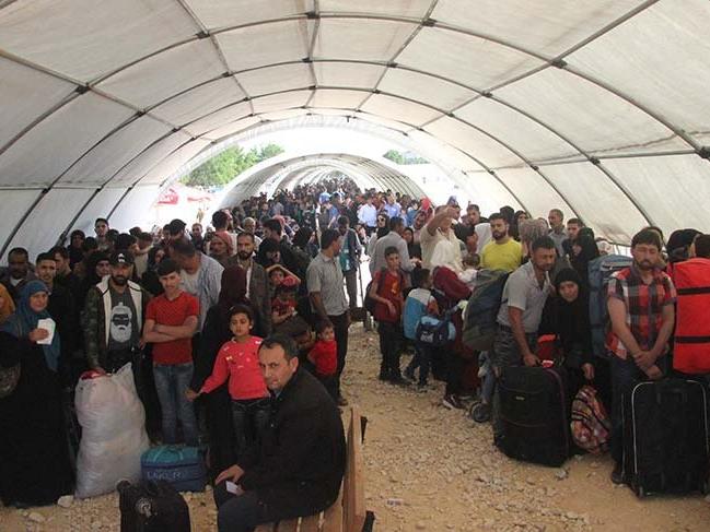 Suriyelilerin bayram için ülkelerine dönüşleri sürüyor
