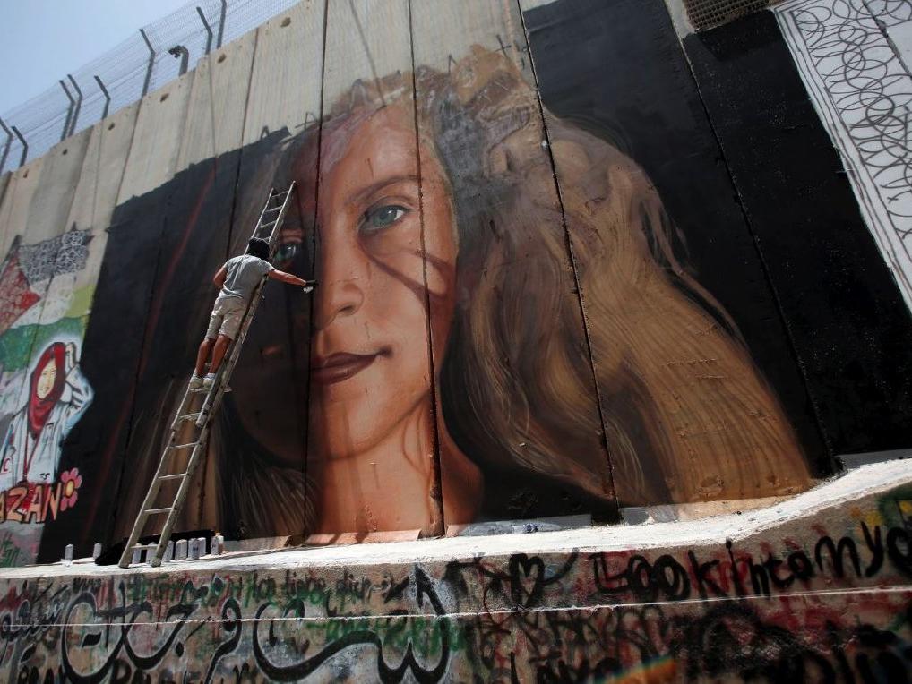 İsrail'den bir garip hamle: Direnişin sembolü serbest, onu çizen içerde