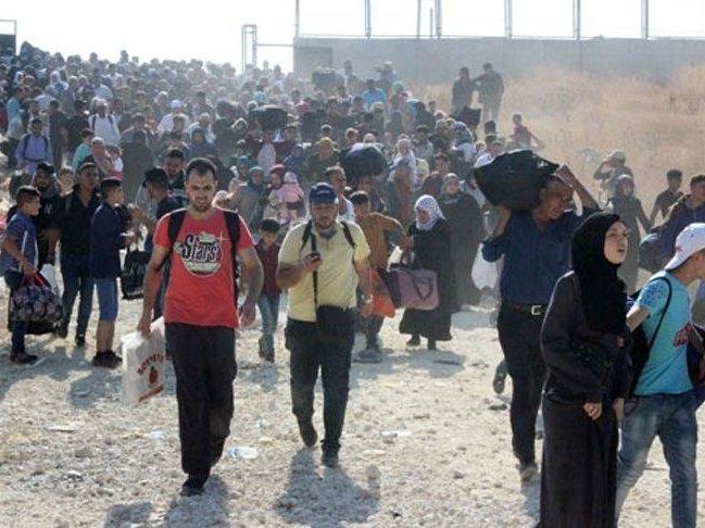 Alman içişleri bakanından çağrı: Tatile giden Suriyelilerin sığınmacı statüsü düşürülecek