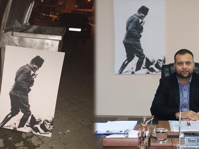 Çöpe bırakılan Atatürk portresini makam odasına astı!