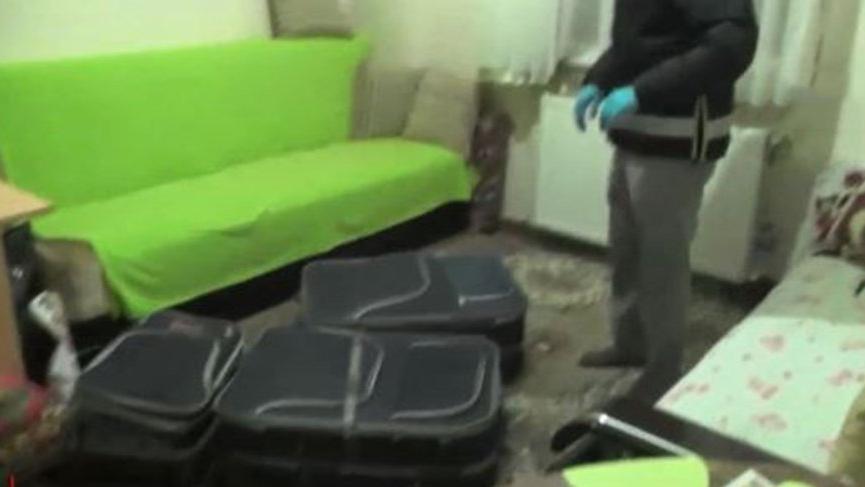 Polis aparta baskın yaptı, bavul dolusu ele geçirildi