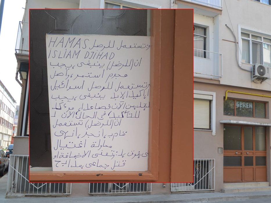 Apartmana asılan 'Hamas ve İslami Cihat' yazısı, kentte korkuya neden oldu