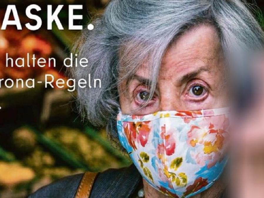 Berlin'de şaşırtan 'maske tak' reklamı