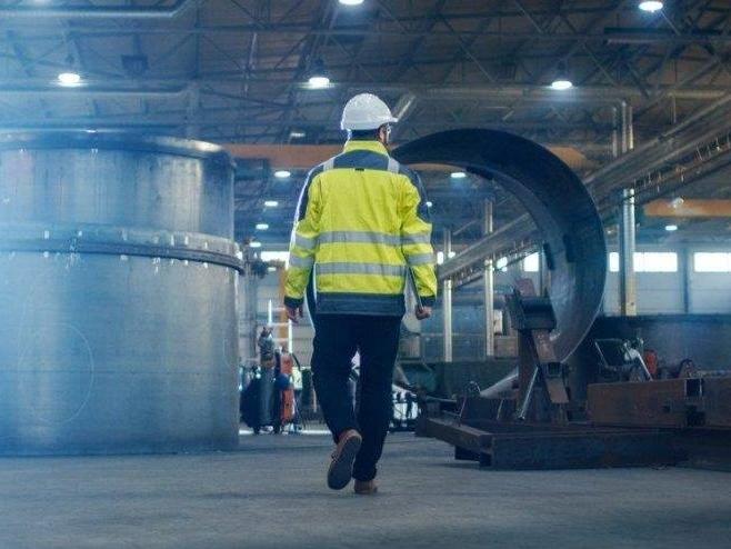 Alman hükümeti büyüme tahminini düşürdü